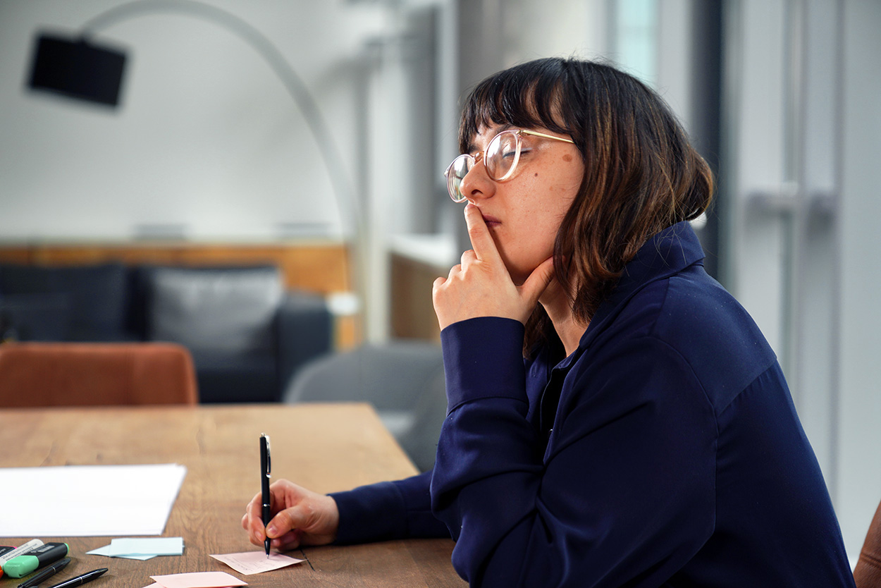 Thinking woman working
